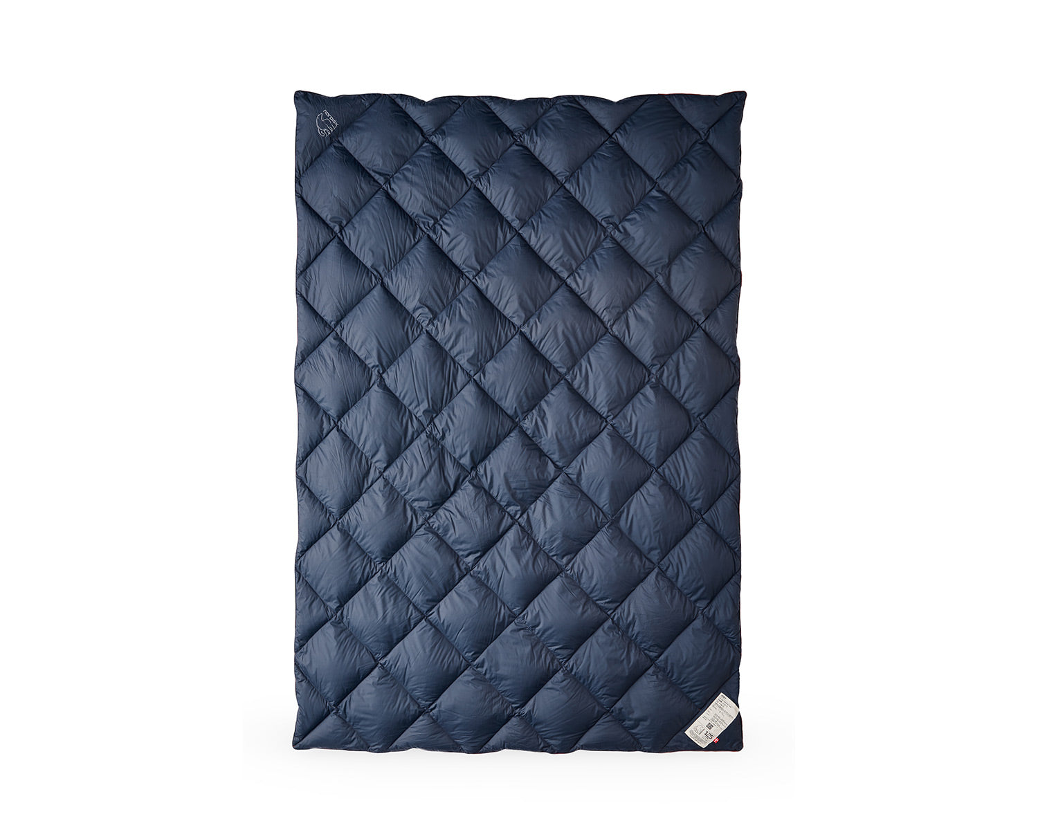 Navy quilted blanket on a white background