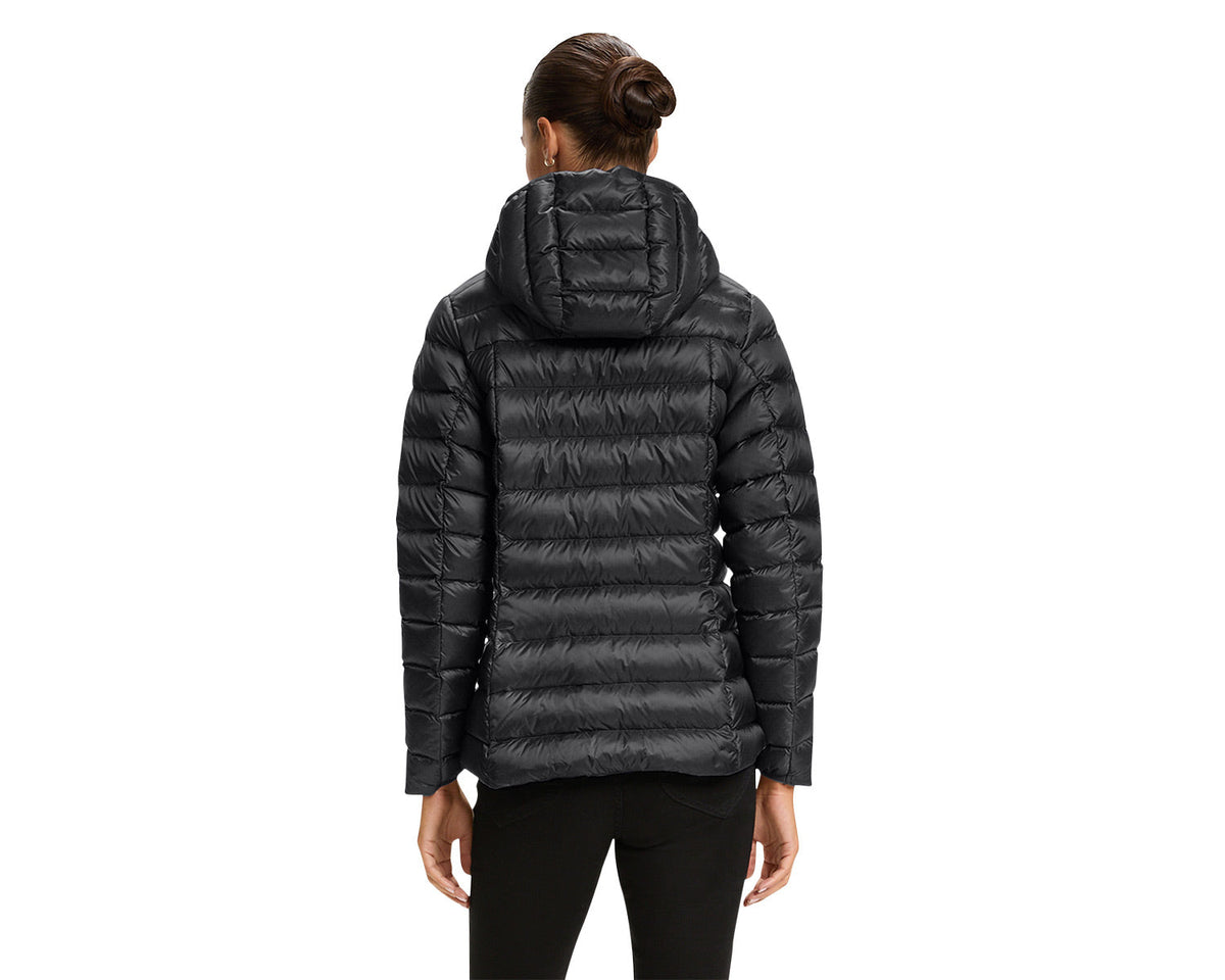 Person wearing a black puffer jacket on a white background