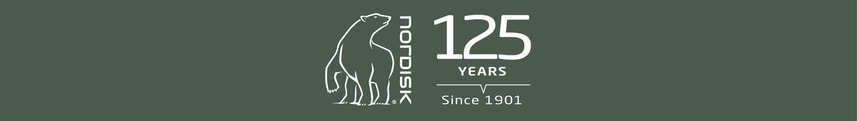 Nordisk 125 års jubilæumsbanner med hvidlogo af isbjørn